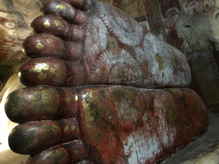 dam buddhas feet